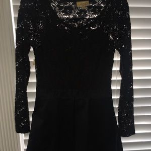 Princess vera wang black lace and leather dress .